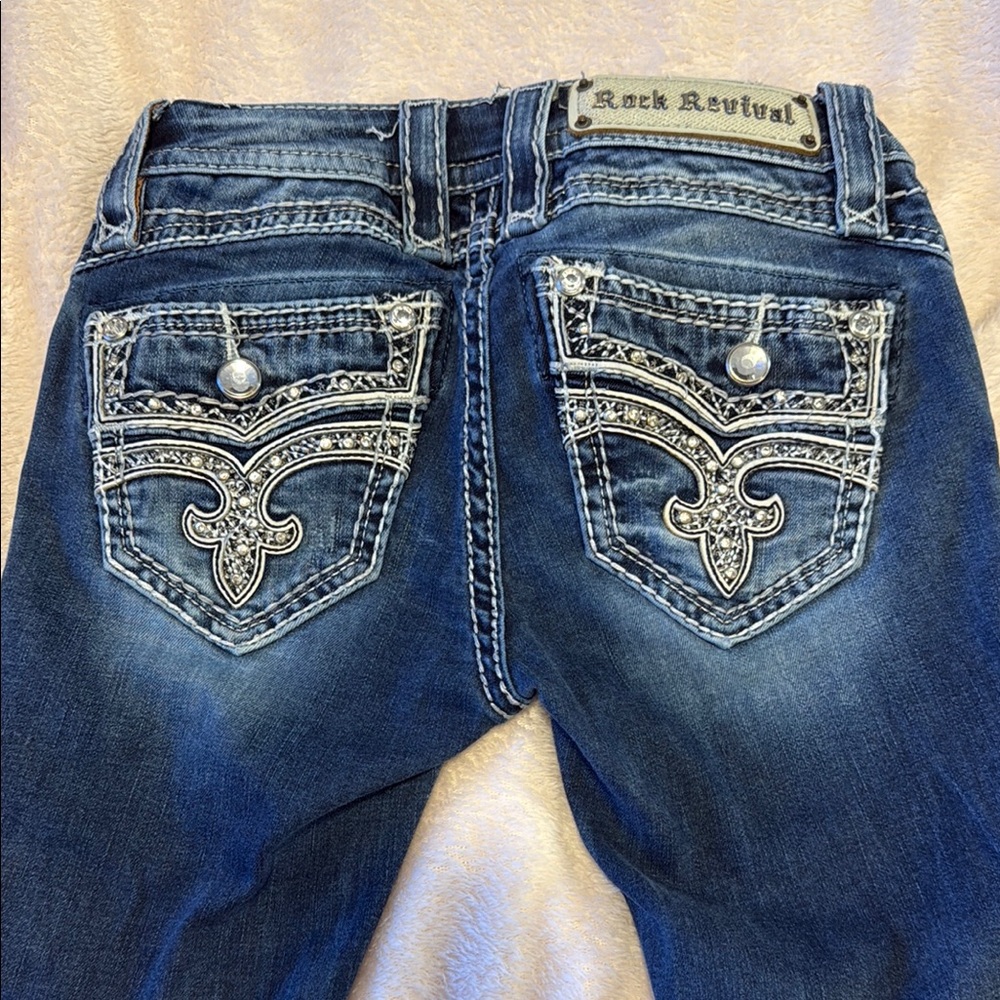 Rock Revival Blue Boot Cut Jeans with Decorative Stitching